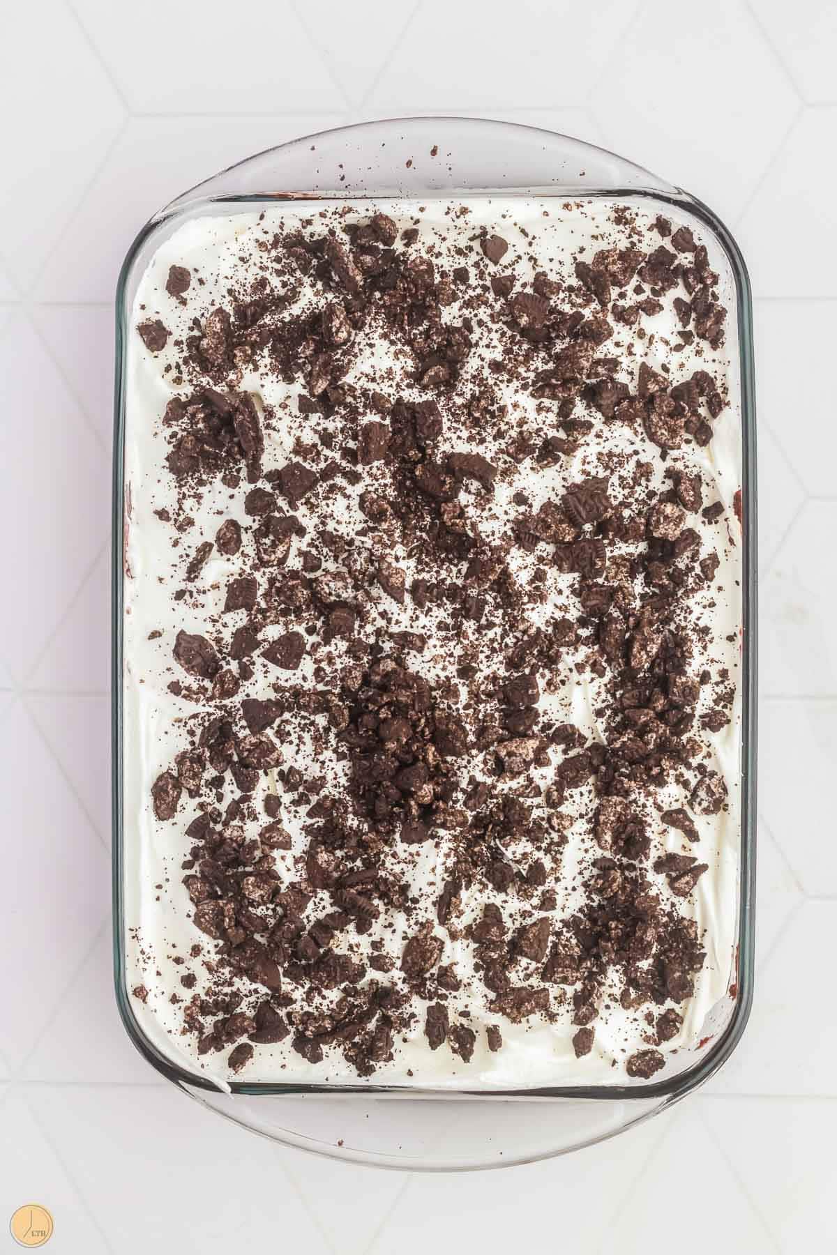 oreo poke cake in a clear baking dish
