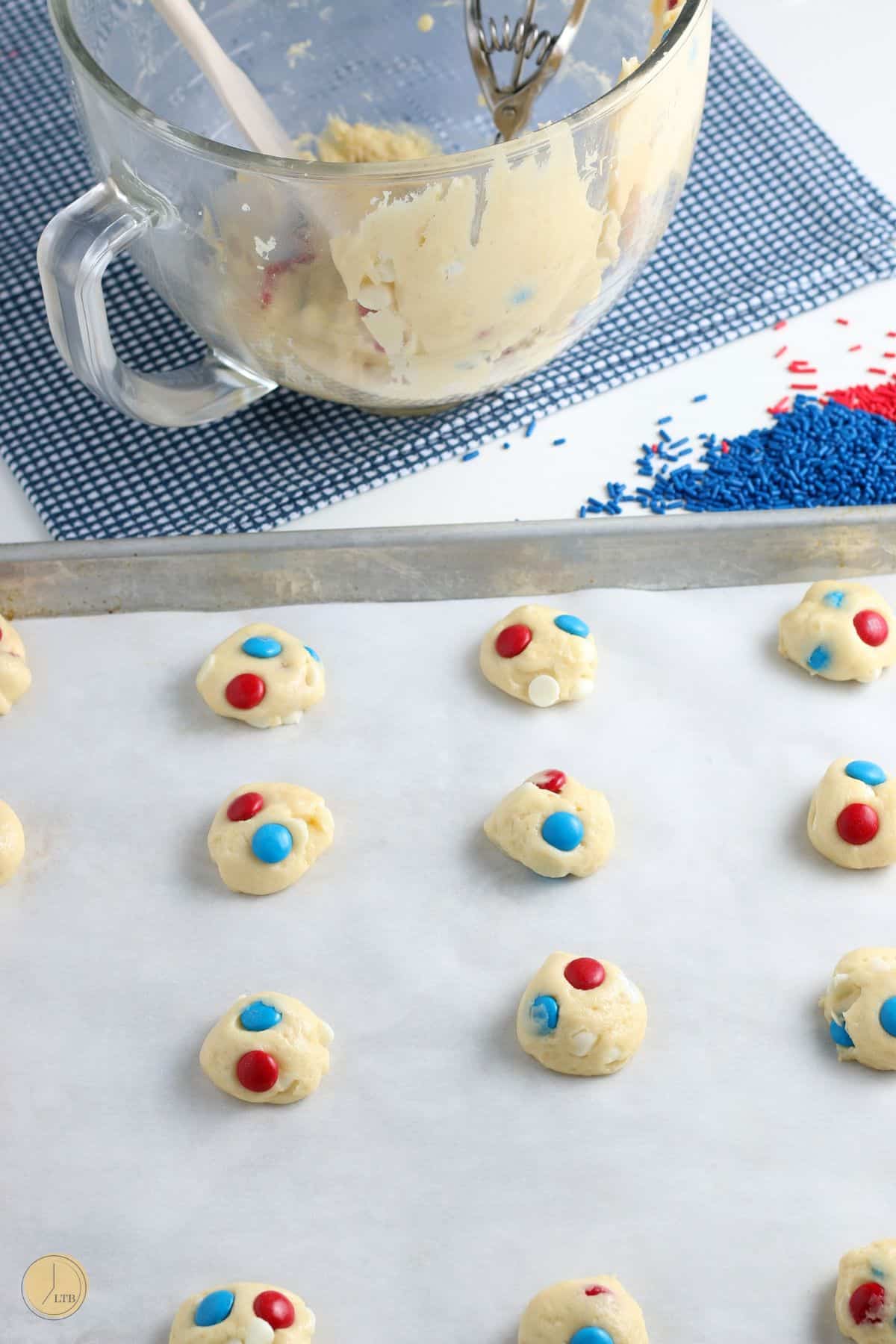 baking sheet with balls of cookie dough on it