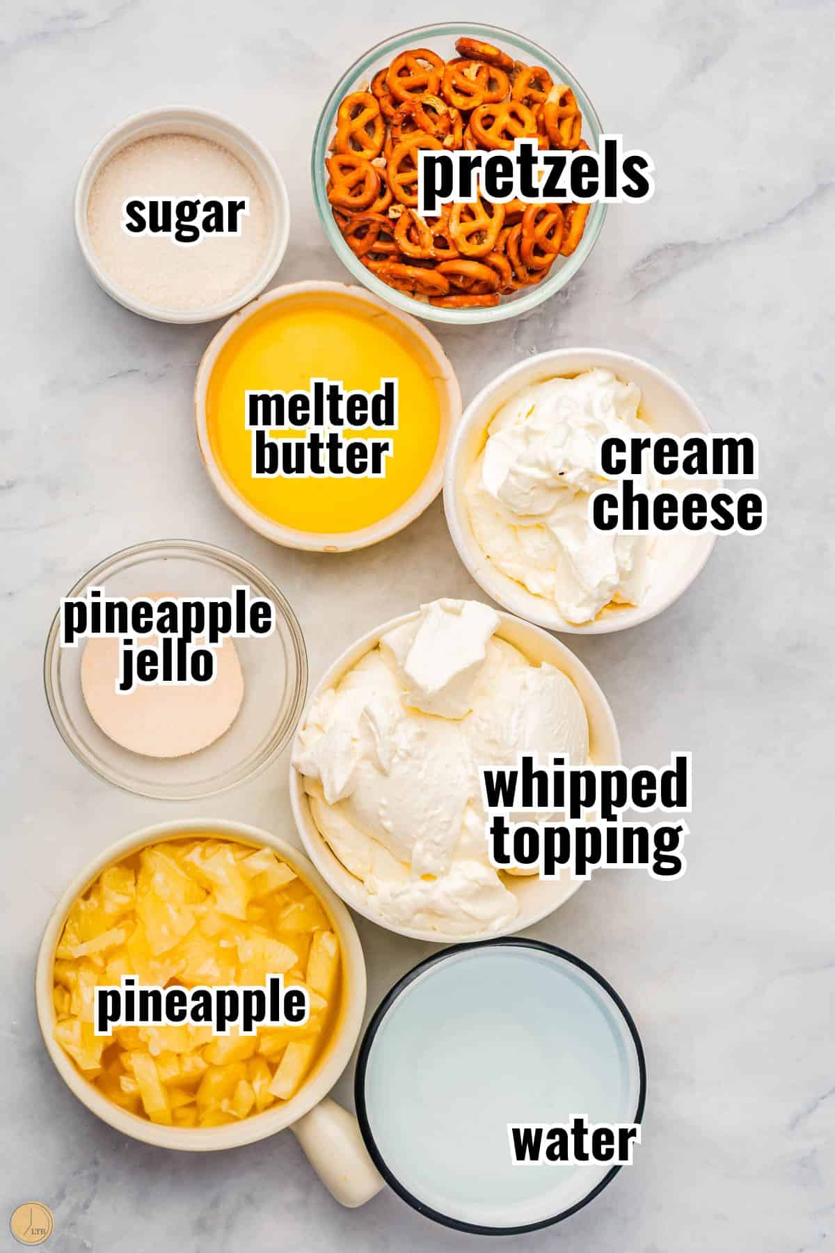 ingredients for a jello salad with pineapple in individual bowls with text overlay labeling them