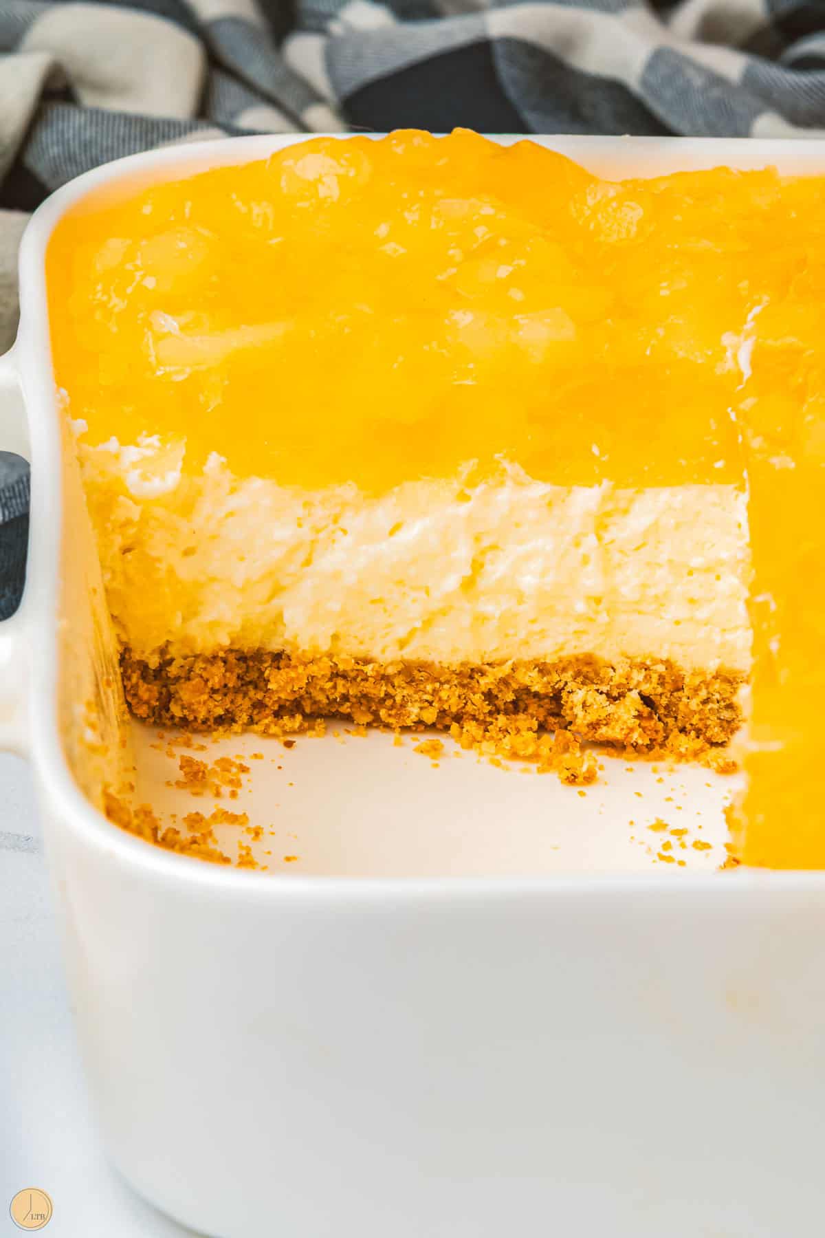 side view of pineapple pretzel salad in the dish