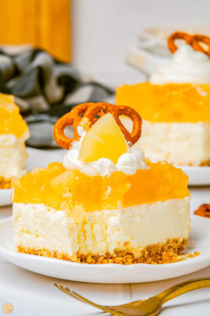 Pineapple pretzel salad on a white plate